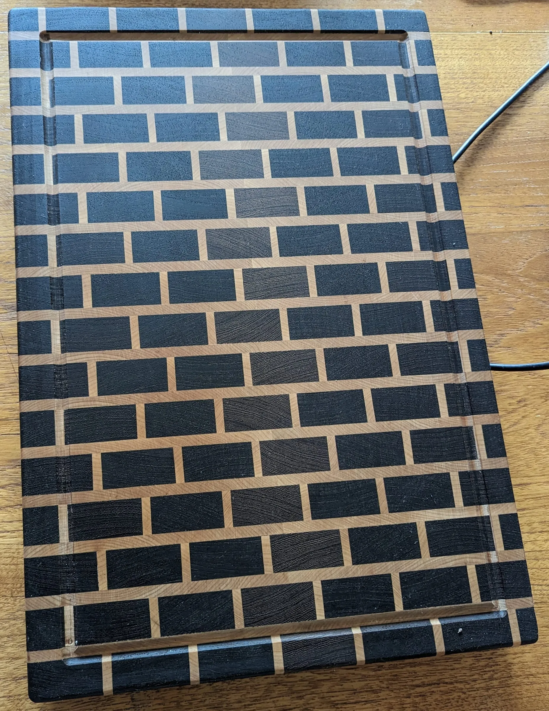 End-Grain Boards & Bowls — Brick pattern: dark bricks with pale mortar lines