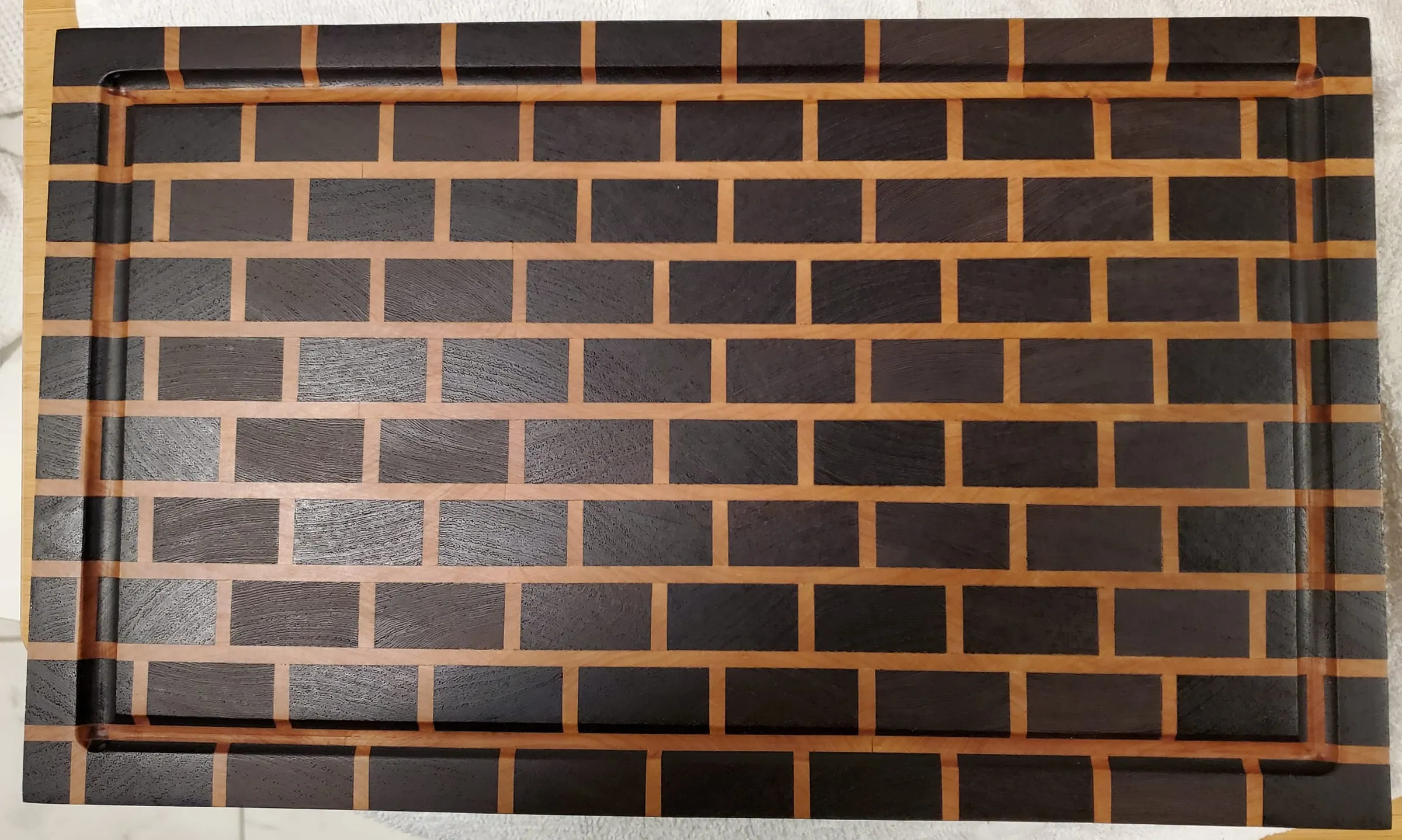 End-Grain Boards & Bowls — Brick pattern with warm cherry mortar