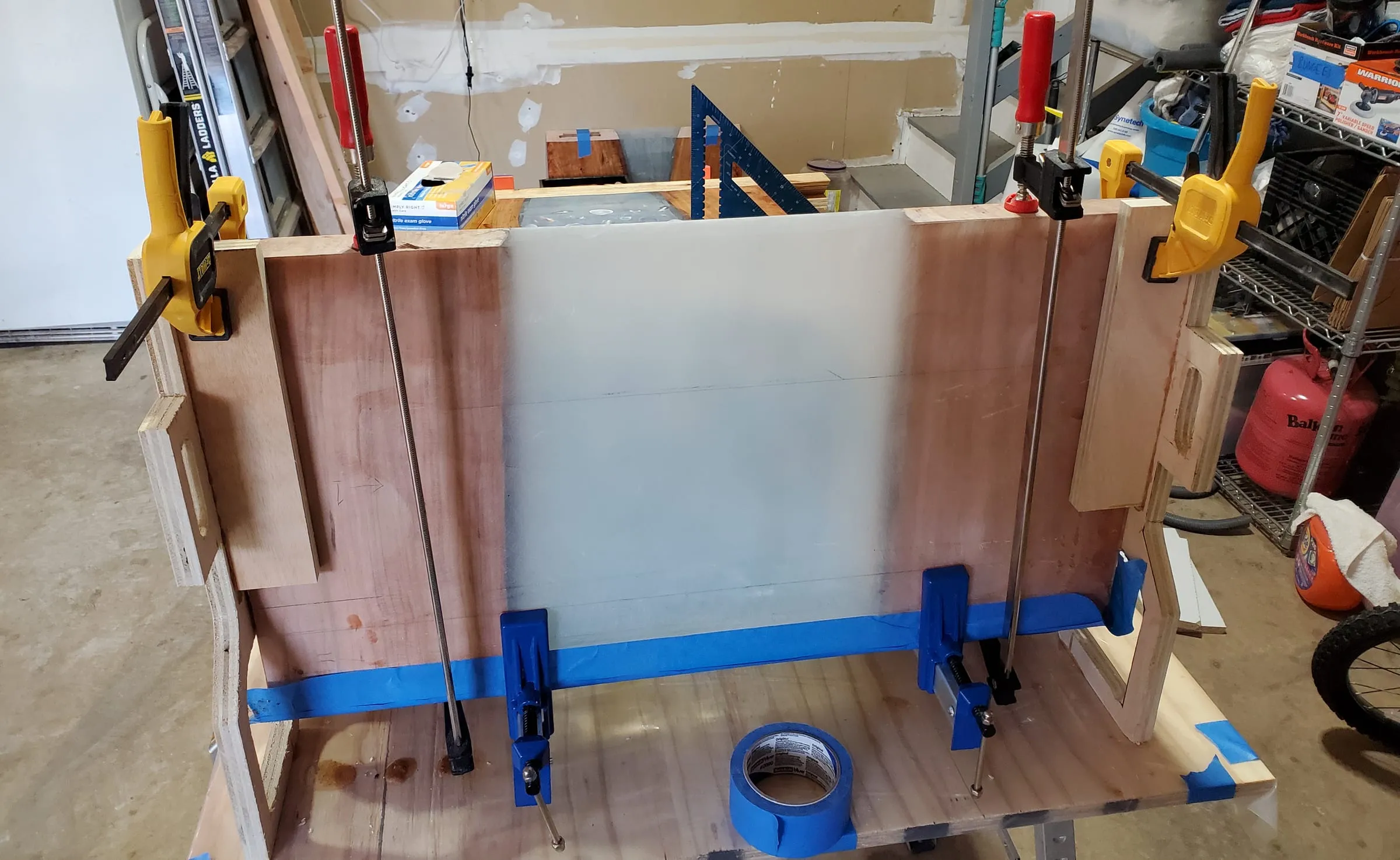 Coffee River Table — Waterfall end clamped while the glue dries