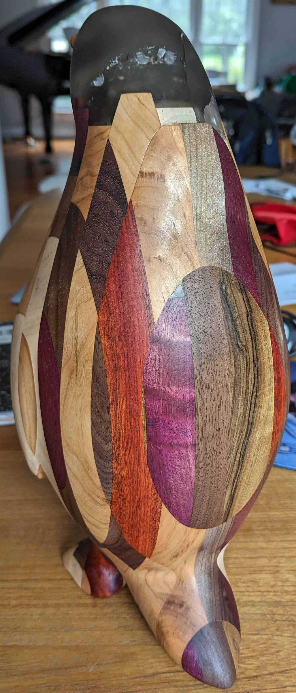 The Penguin — Purpleheart and padauk-red accents on the side