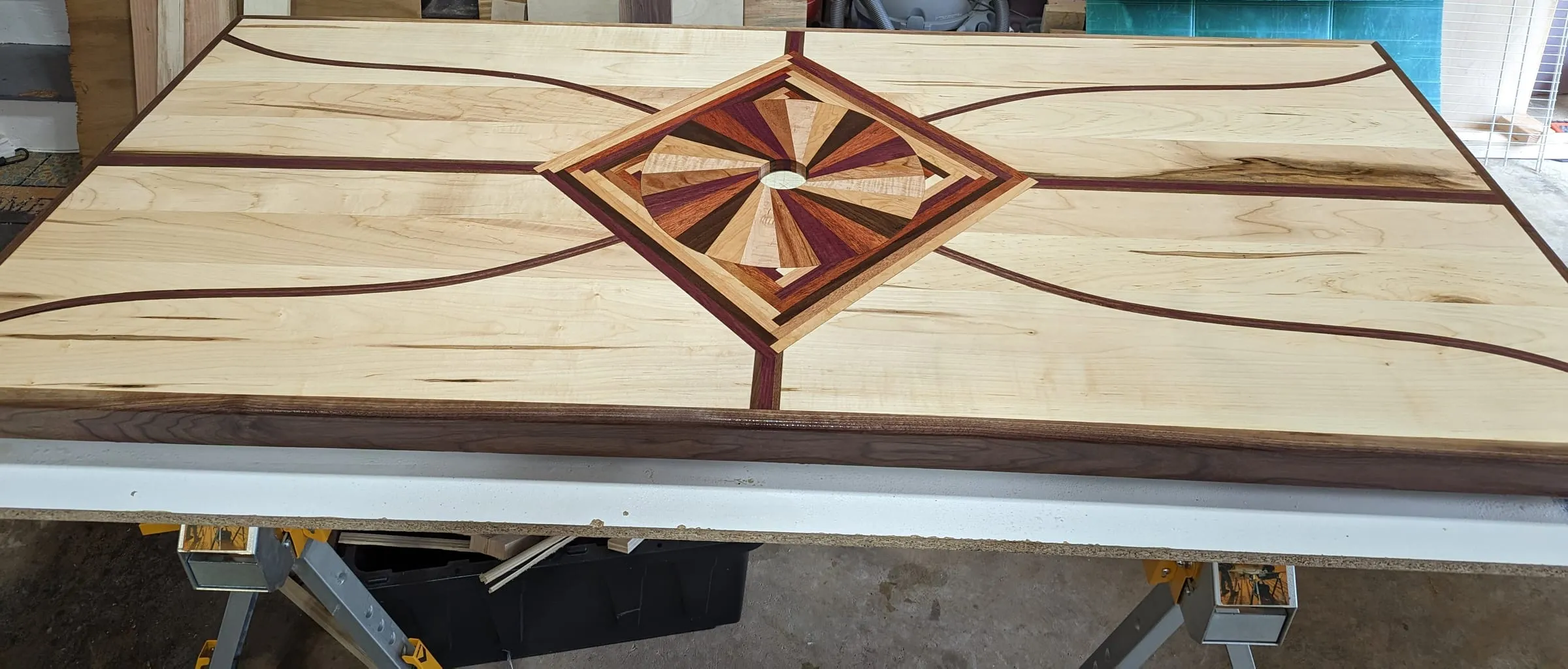 The Starburst Picnic Table — Final finish going on