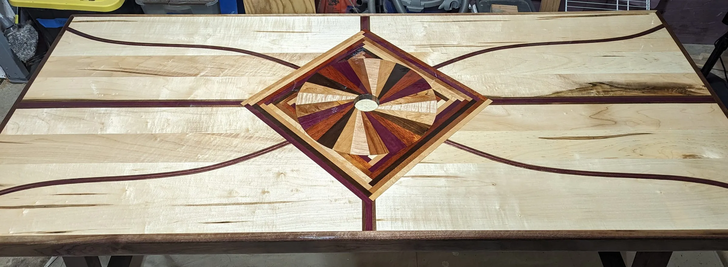 The Starburst Picnic Table — Medallion and inlays in the shop