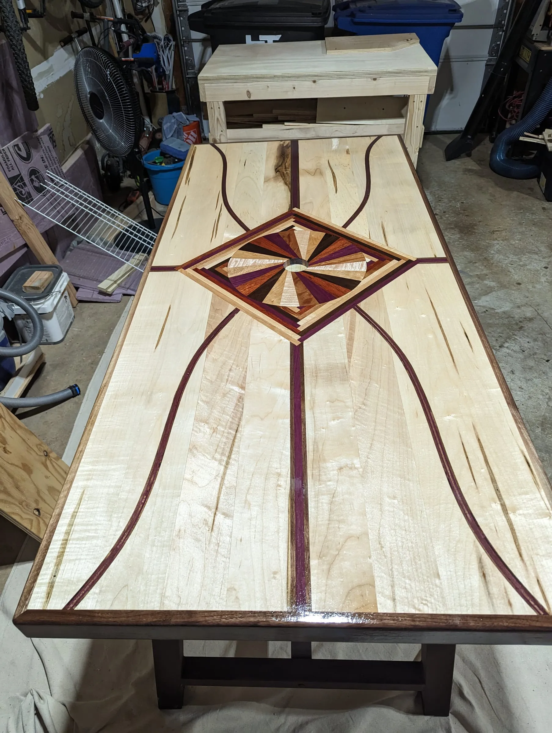 The Starburst Picnic Table — The top from the end, with the base below