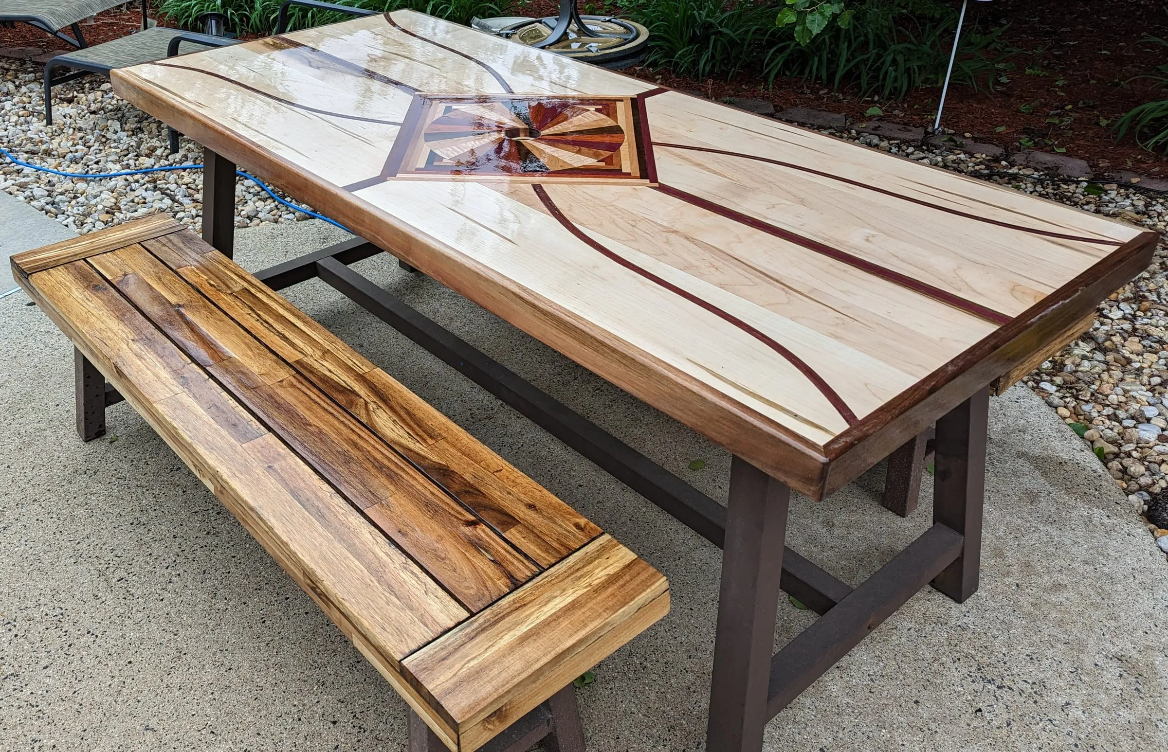 The Starburst Picnic Table — The bench: strips of different woods