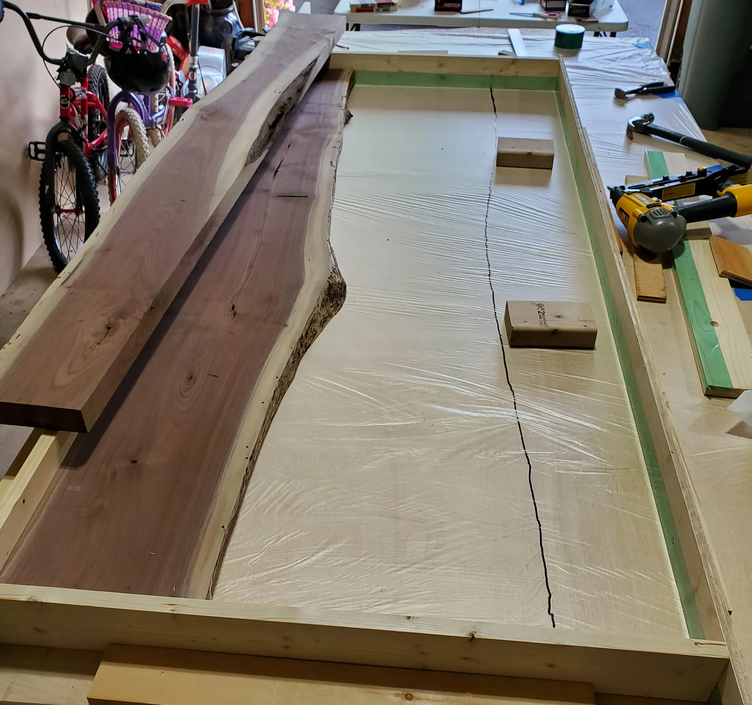 The Outdoor River Table — Slabs set into the pour frame