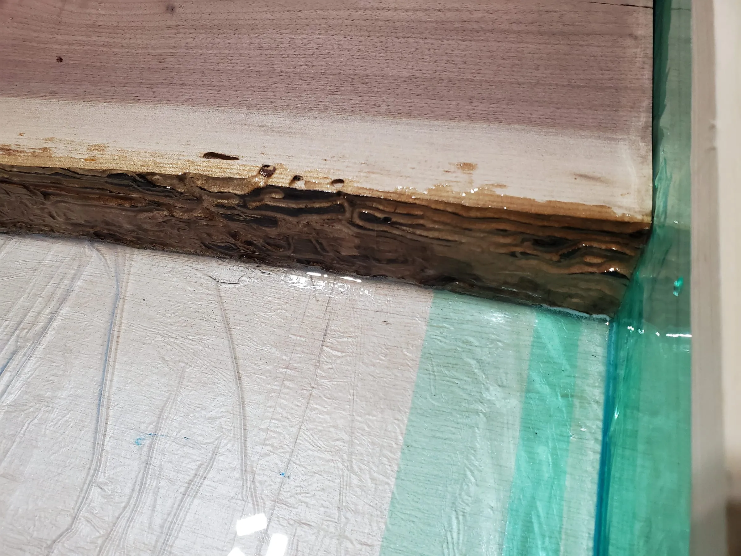 The Outdoor River Table — Sealing the edge of the frame with tape