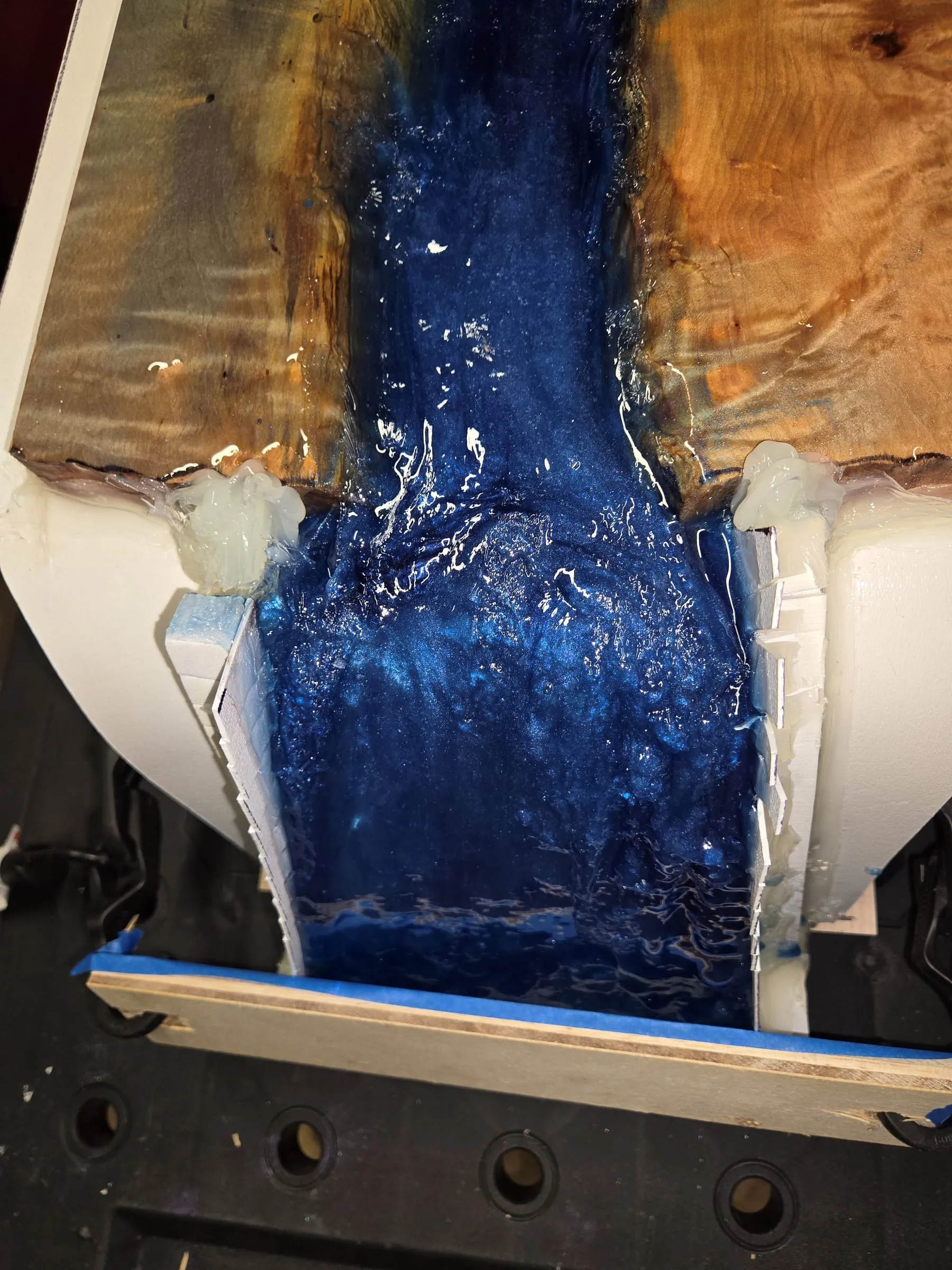 Waterfall Jewelry Box — Pouring: the epoxy flowing over the edge in its mold